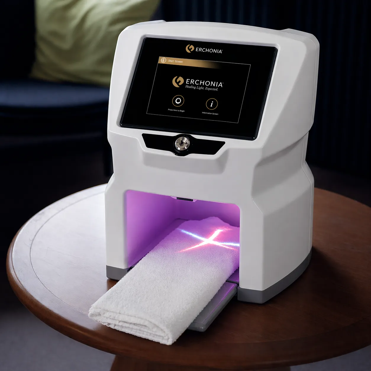 A patient’s foot in the Lunula Laser treatment chamber