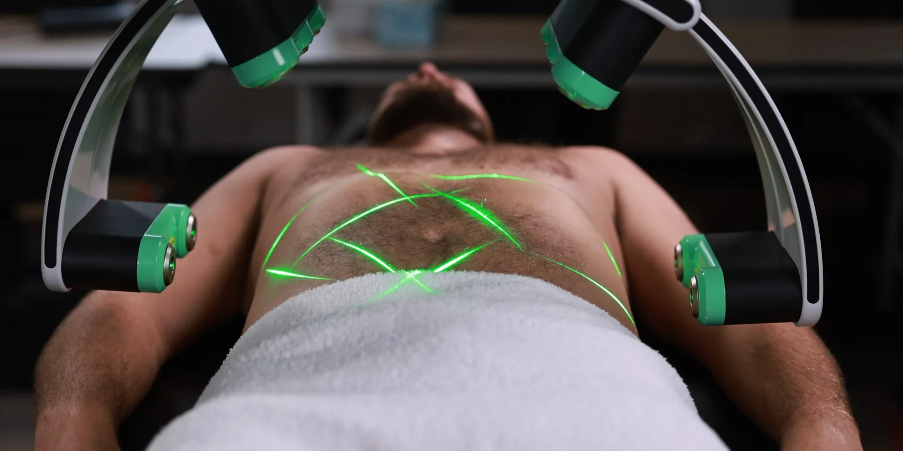 A patient beneath the Emerald laser