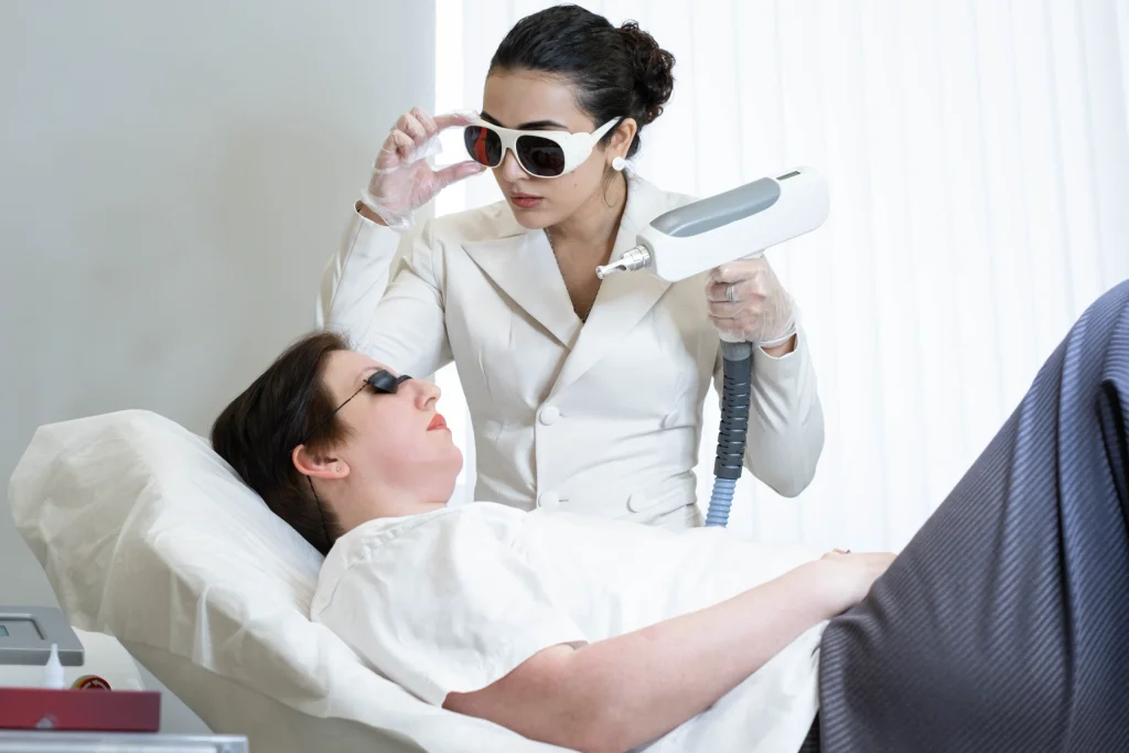 Laser facial treatment by a professional
